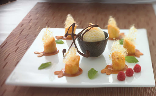 Caramelized bananas served with vanilla ice cream, a yummy treat in Celebrity Cruises's Silk Harvest restaurant.
