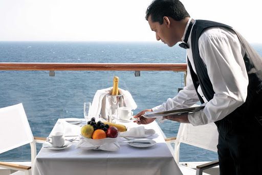 Enjoy a peaceful dining experience out on your private balcony with impeccable service aboard Celebrity Century.