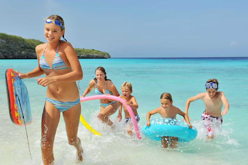 Curacao-beach-kids - With more than three dozen beaches, Curacao is a popular family vacation destination.