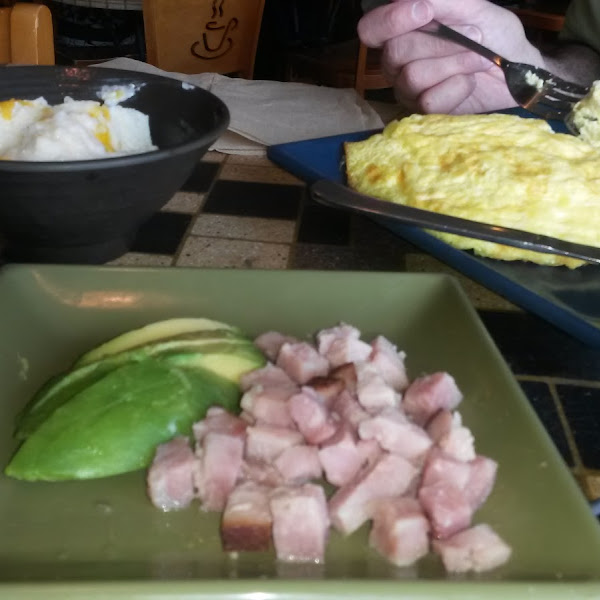 GF swiss cheese omelet with grits, avocado and ham