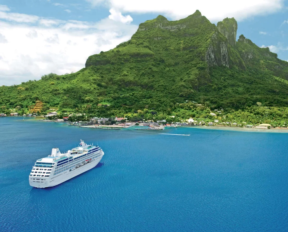 Ocean-Princess-in-BoraBora - Ocean Princess — the smallest ship in the Princess fleet along with her twin, Pacific Princess — moors off the beautiful tropical paradise of Bora Bora.