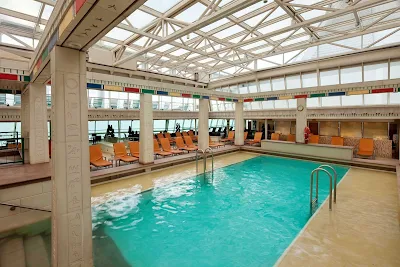 The glass-canopied Solarium pool, along with two hot tubs, on Rhapsody of the Seas is an adults-only area.