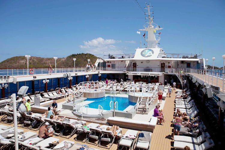 Take in the sun and the breeze on the pool deck of your Azamara cruise.