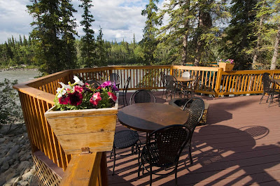 The McKinley Chalet Resort is in the heart of the Denali Canyon on the banks of the Nenana River, less than 2 miles from the entrance to Denali National Park. In summer, dining on the deck gives you a great view of the scenic vistas.