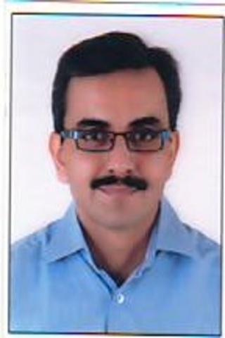 Dr. Dhaval Rajde