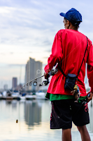 Fishing it up by Tim Anthony Manuel -  