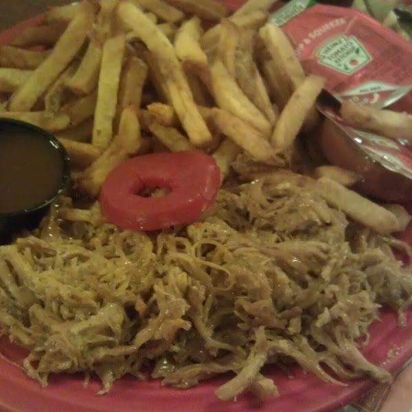 Pulled pork dinner with fries & the cute little pickled apple ring comes with every plate!