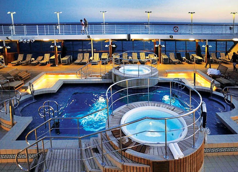 Oceania Nautica's large heated pool and whirlpool spas are the ideal location to unwind and enjoy your travels.
