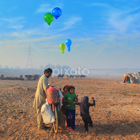 Children playing with baloons by Sheraz Mushtaq - People Street & Candids