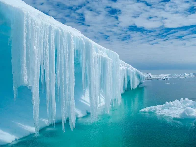 See the otherwordly cool blue ice of Antarctica during a G Adventures expedition aboard the Expedition. 