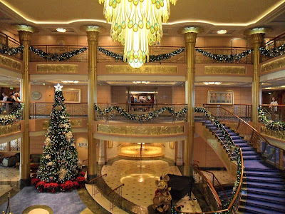 The atrium lobby on Disney Fantasy during Christmastime.