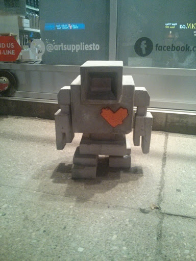 Orange Heart Lovebot Statue