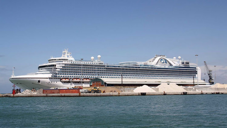 Ruby Princess berthed at Alto Fondale wharf at the port of Livorno in Italy. 