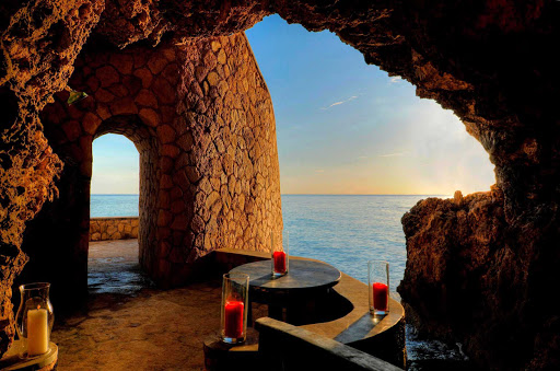 Blackwell-Rum-Bar-Jamaica - Perched on the cliffs overlooking Negril's scenic West End in Jamaica, Blackwell Rum Bar is a sight like no other. The cave, created from two limestone grottos, offers a full open bar. (Talk about your man cave!) Order any drink, but make it rum.