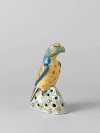 Papegaai van veelkleurig beschilderde faïence
