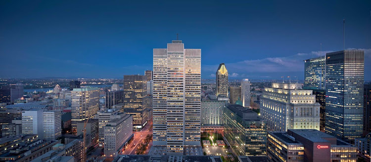 The cityscape of downtown Montreal at dusk.