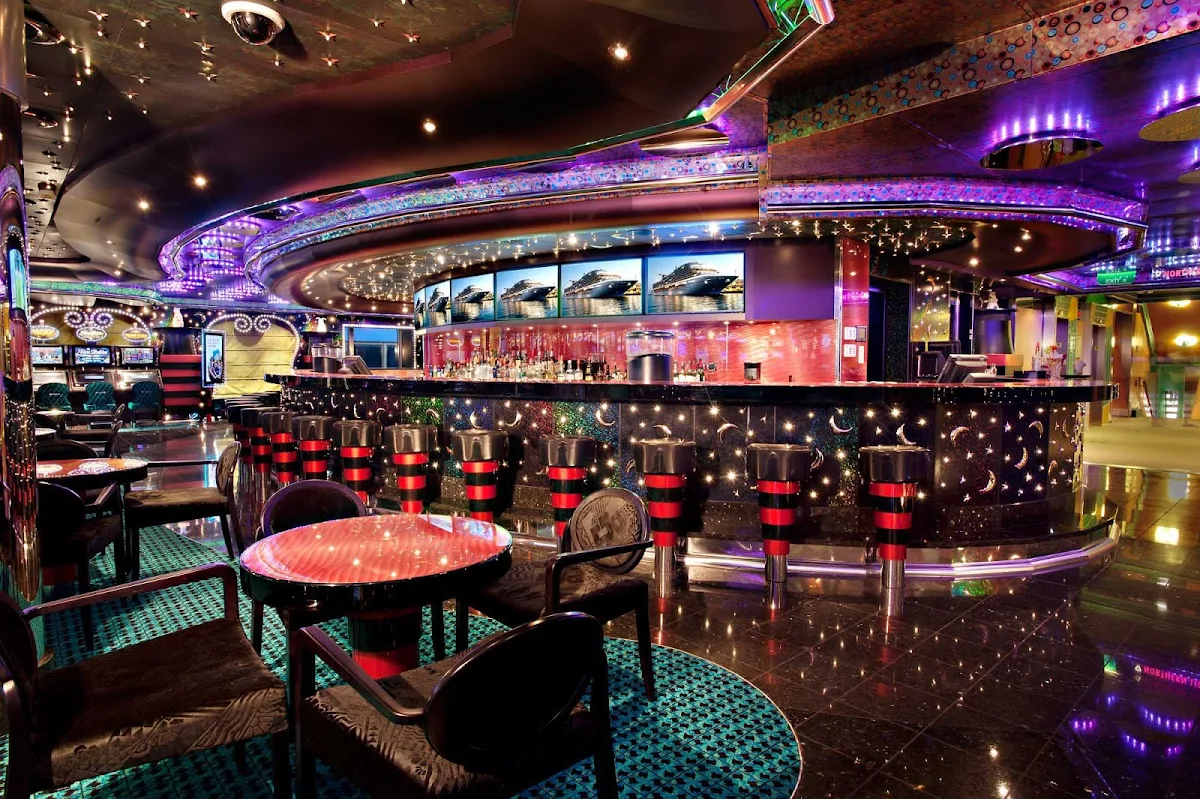 Carnival-Magic-Hat-Trick-Casino - Try your luck at the Hat Trick Casino's tables and slot machines, on deck 5 of Carnival Magic.