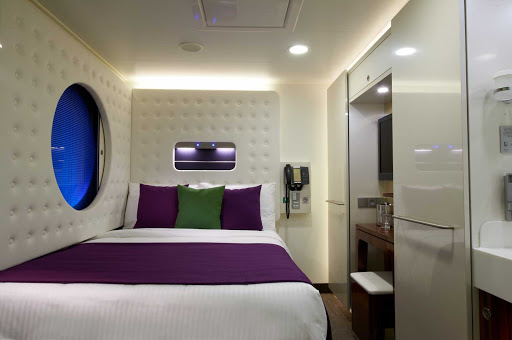 Norwegian Breakaway's specially designed studio for the single traveler features a full size bed, private bathroom, sink and shower.
