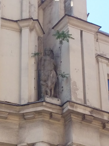 Statue With A Tree