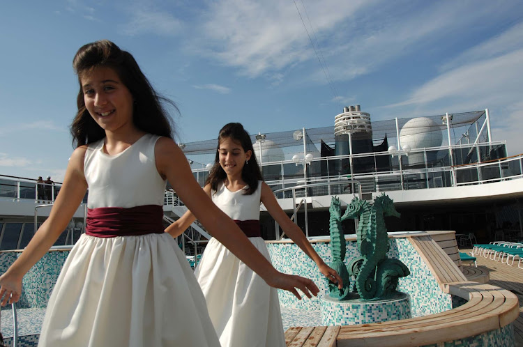 Kids can dress up and have fun on deck during Formal Night with the Junior Cruisers on a Crystal cruise.