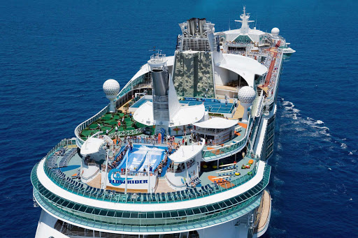 Liberty-of-the-Seas-top-deck - Liberty of the Seas' sports area offers lots of fun in the sun, including time on the FlowRider surf simulator, rock climbing wall, mini-golf course and sports court.