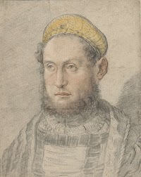 A Man with a Beard and Gold Cap