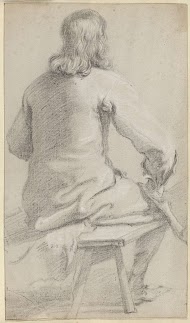 Zittende man op de rug gezien, zijn hoed in zijn hand op zijn knie