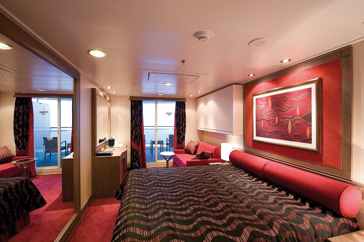 MSC Poesia's spacious Balcony Staterooms feature lush reds and rich textures. Just outside, the Mediterranean wows with its own palette of colors.  