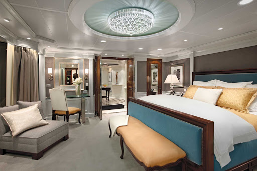 Sail in grand style: A look at the bedroom and its stylish light fixture inside the Owners Suite of Oceania Riviera.