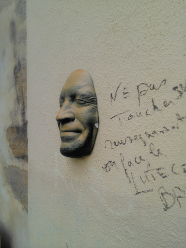Face Dans Le Mur