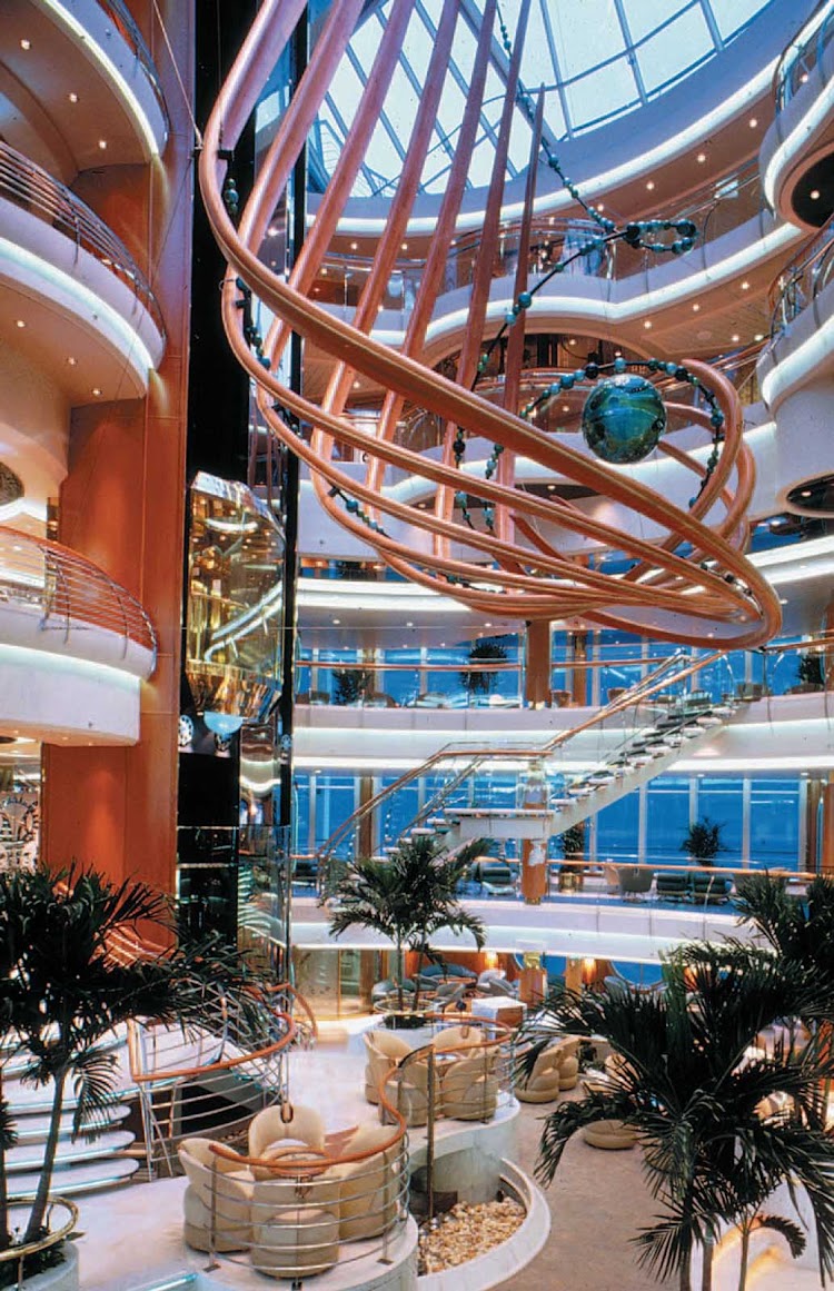 Vision of the Seas' Centrum, a multi-level atrium and hub of the ship, hosts live music, art auctions, aerial shows and other entertainment.