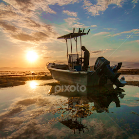 Man n the Boat by Erwan Setyawan - Landscapes Sunsets & Sunrises