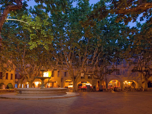 place-aux-herbes - Place Aux Herbes in Uzès is a square filled with shopping, dining and dwellings. It's in the Languedoc-Roussillon region of southern France. 
