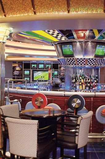 Jewel-of-the-Seas-Pit-Stop - Grab a drink or snack, watch your choice of sports on TV, and relax at the Nascar-themed Pit Stop Sports Bar aboard Jewel of the Seas.