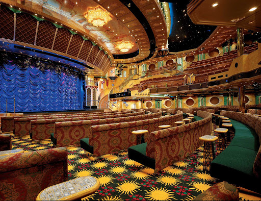 Enjoy an evening's entertainment at Follies, Carnival Legend's two-level main show lounge.