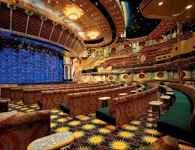 Enjoy an evening's entertainment at Follies, Carnival Legend's two-level main show lounge.