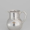 Water jug with plant and floral motifs