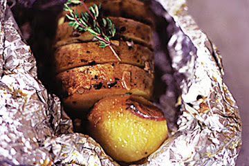 Garlic, thyme and anchovy baked potatoes