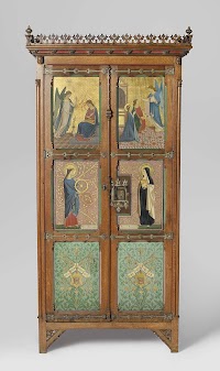 Music cabinet and piano with a relic of St Cecilia