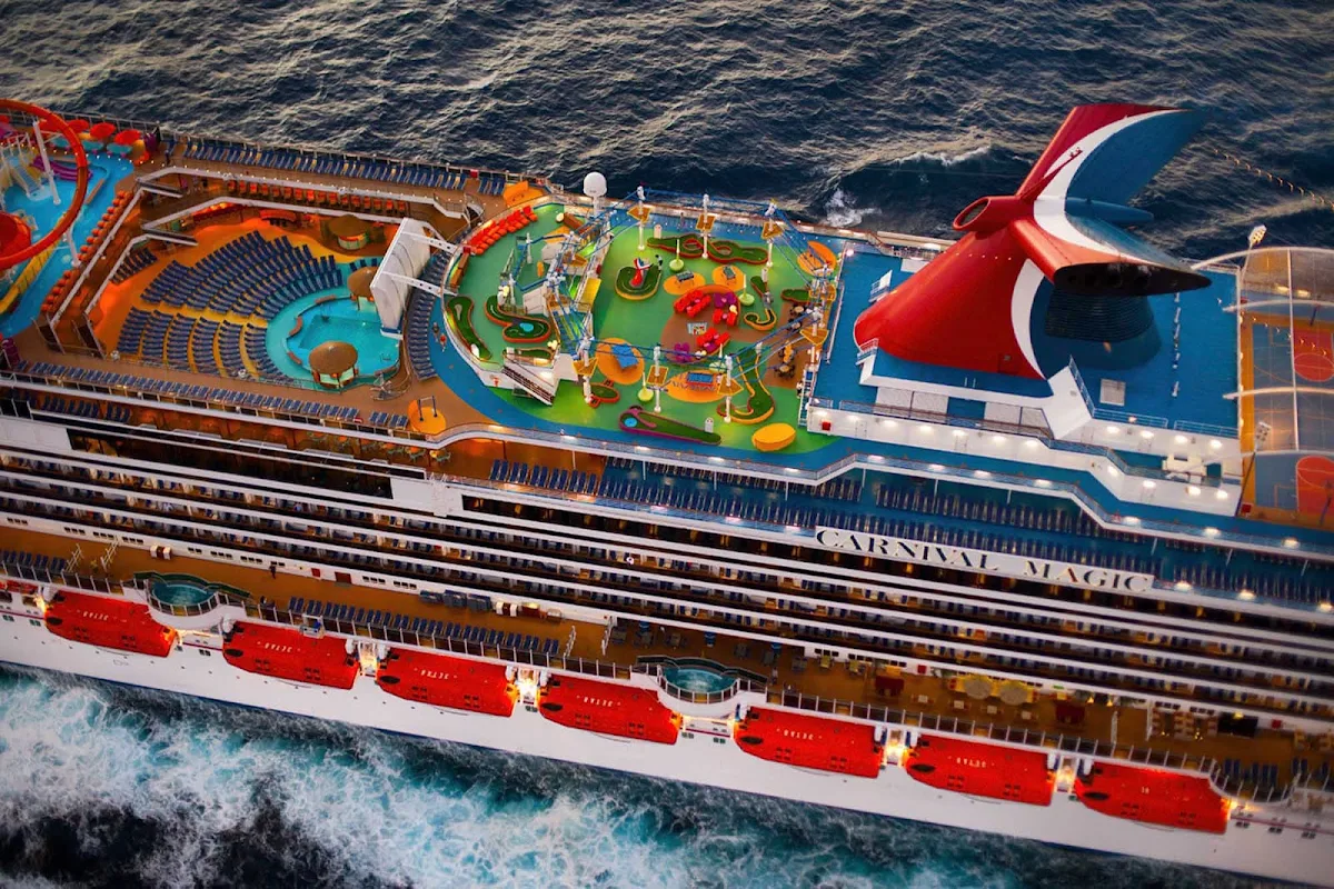 Carnival-Magic-SportSquare-Aerial - Play a friendly game of mini-golf or challenge yourself on the SkyCourse ropes on Carnival Magic's SportSquare.