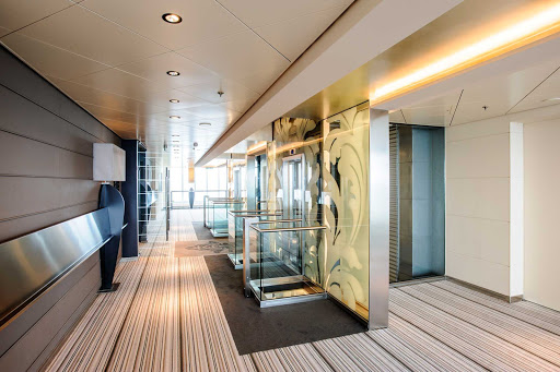 Modern, custom-designed glass elevators bring Europa 2 guests from one deck to another in style.