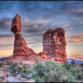 Sunrise at Balanced Rock by Bruce Martin - Landscapes Travel