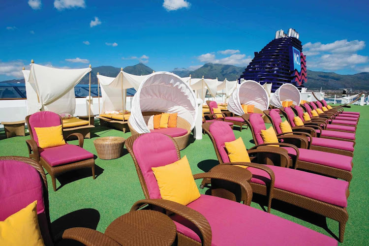 Get a tan while enjoying the breeze and the view on the private sun deck of the Norwegian Jade's Courtyard.