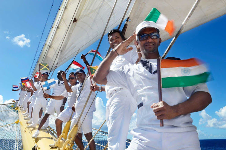 An attentive crew — nearly one crew member for every two passengers — is ready to assist during your Star Clippers cruise.