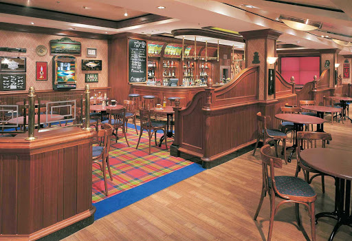 The Red Lion Pub, a traditional English pub on deck 7 of Norwegian Star, offers drinks, a pool table and entertainment on large-screen TVs.