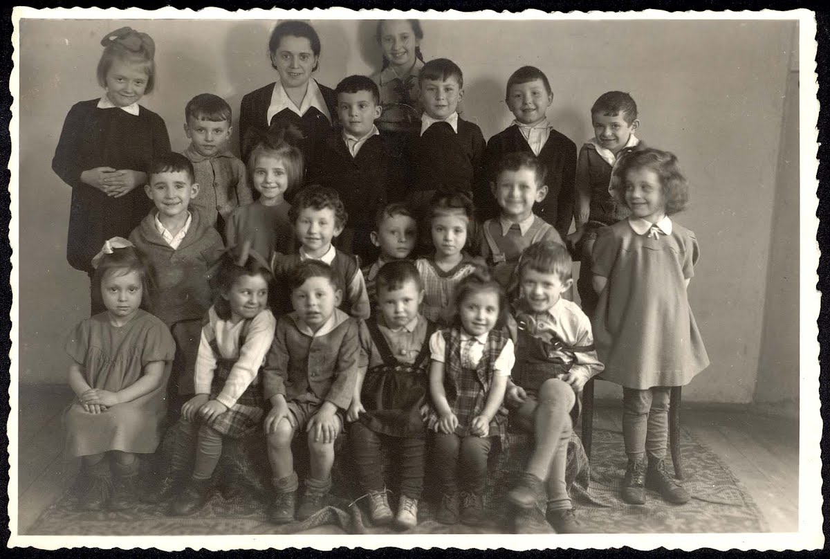Otwock, Poland, Children aged 3-7 from the Jewish children's home with their teacher, Oliwa Franciszka.
