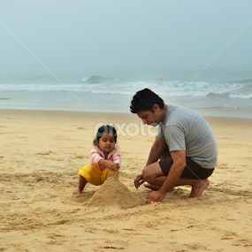 Building the castle..  by Maadhabi Bhattacharyya - People Street & Candids