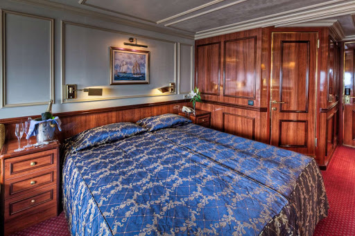 Book a cabin aboard Royal Clipper — some come with a full marble bathroom, king-size bed, living area and more.