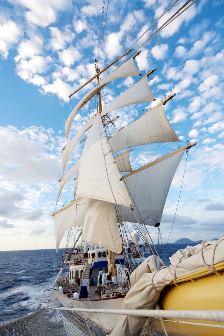 Feel the wind fill the sails of Royal Clipper. The ship has five masts that fly 42 lovely sails with a sail area of 56,000 square feet.