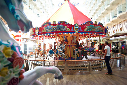 Walk along Oasis of the Seas' boardwalk for family entertainment — including a colorful carousel — dining options and more.